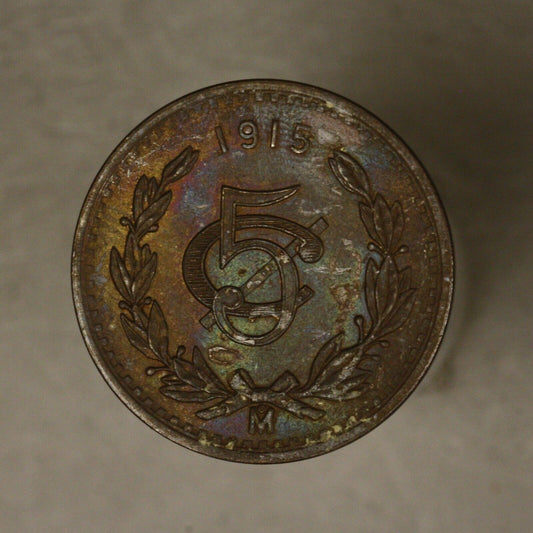 Mexico 1915 5 Centavos dark unc some colored toning on obverse