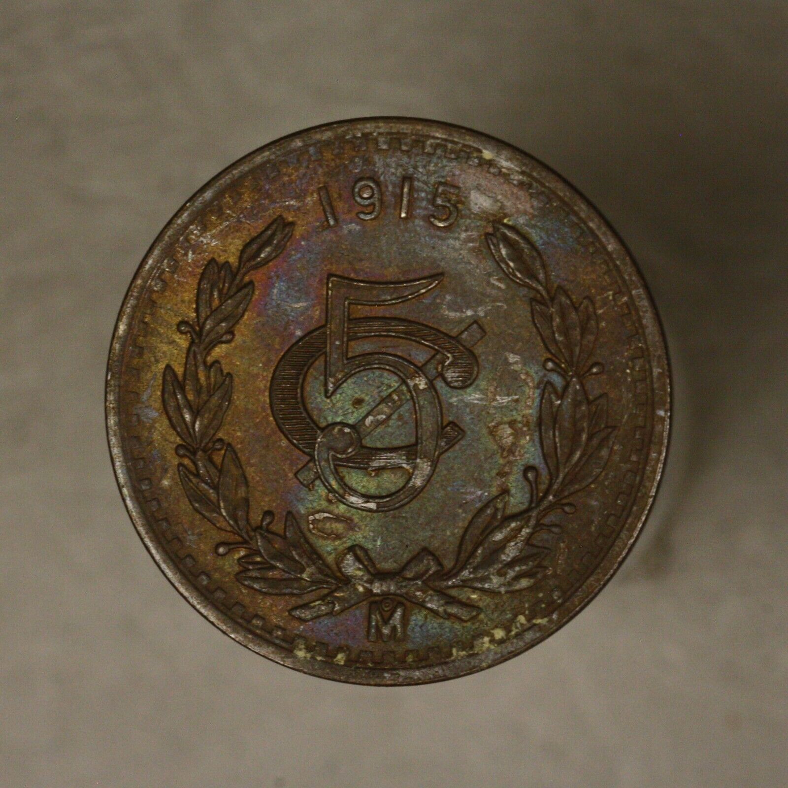 Mexico 1915 5 Centavos dark unc some colored toning on obverse