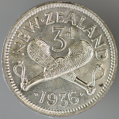 New Zealand 1936 3 Pence featuring two crossed Māori patu (short-handled clubs) A3608