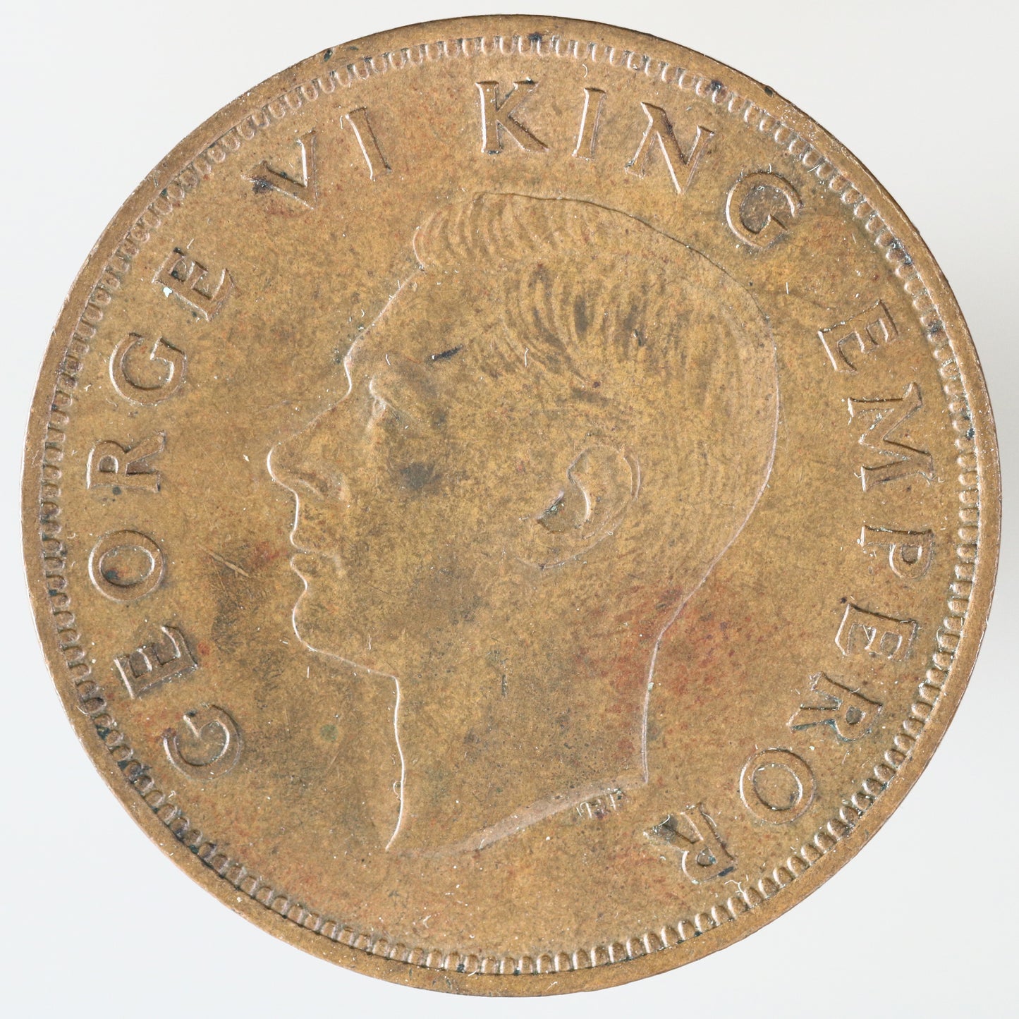 New Zealand 1941 One Penny featuring a tūī bird perched on a kōwhai branch A3607