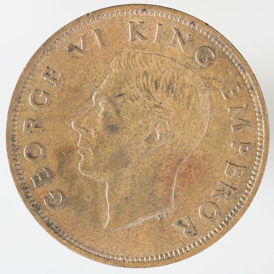 New Zealand 1941 One Penny featuring a tūī bird perched on a kōwhai branch A3607